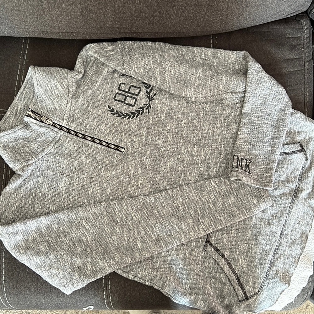 Pink VS half zip with raw hem